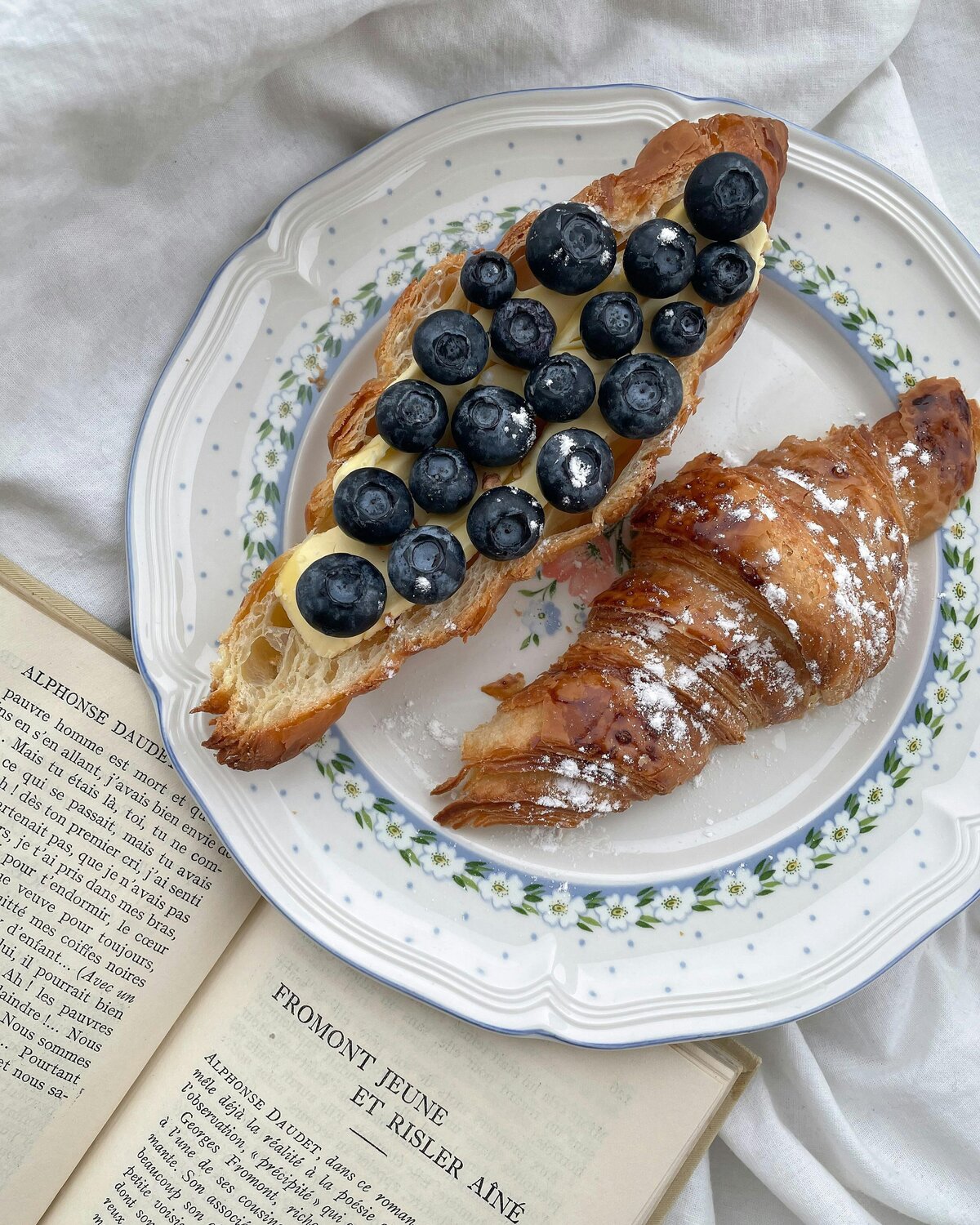 Soft blue fabric background creating a calm, soothing aesthetic representing virtual non diet nutrition counseling.