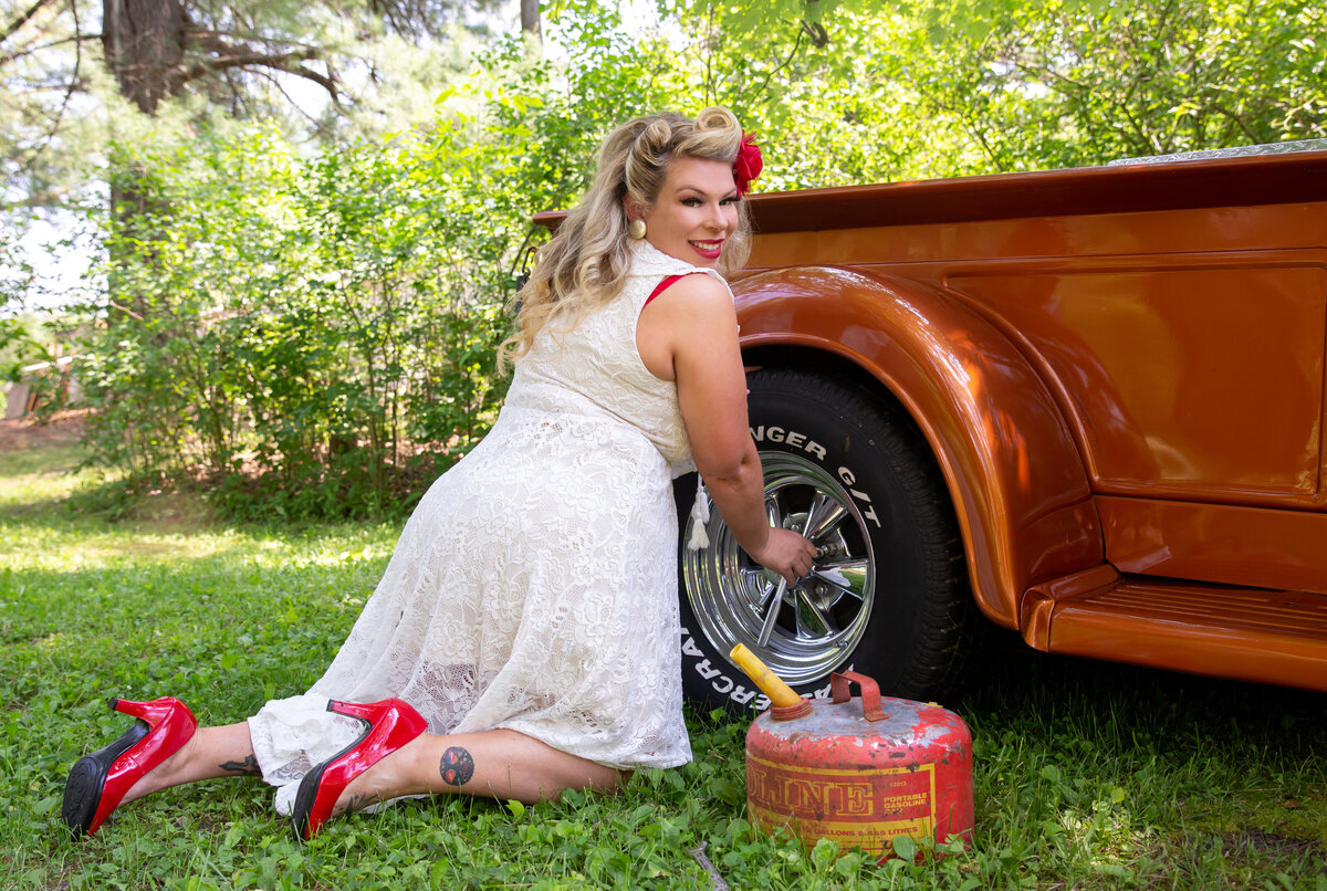 goddess studio boudoir woman pinup style broke down need gas old gas can red heels i can fix it