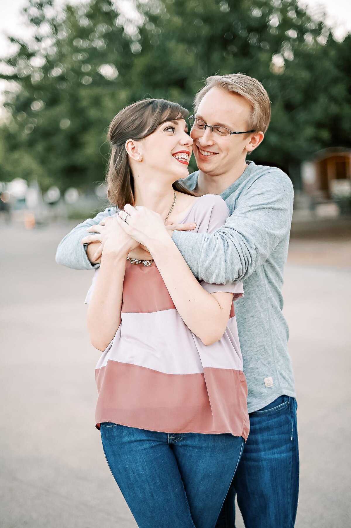 heritage-square-engagement-session-couple-holding-each-other