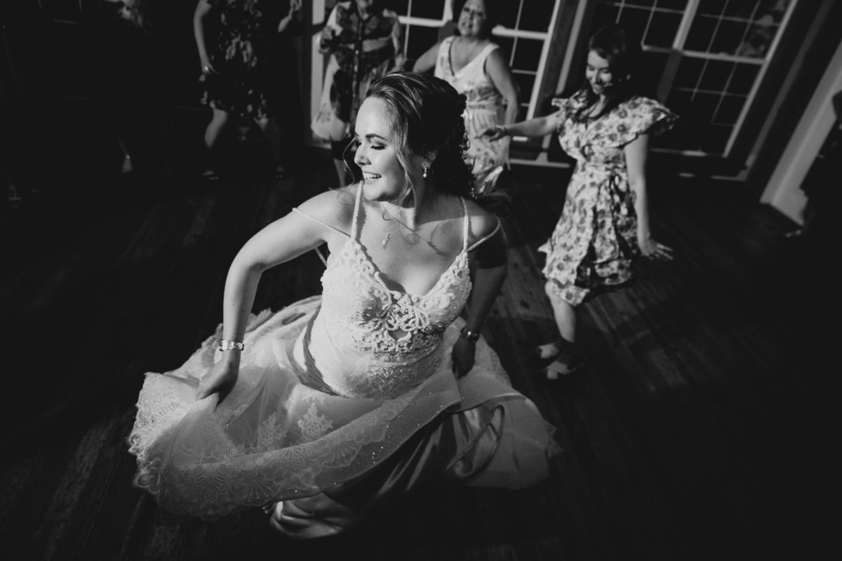 bride dancing at cobble hill wedding merridale