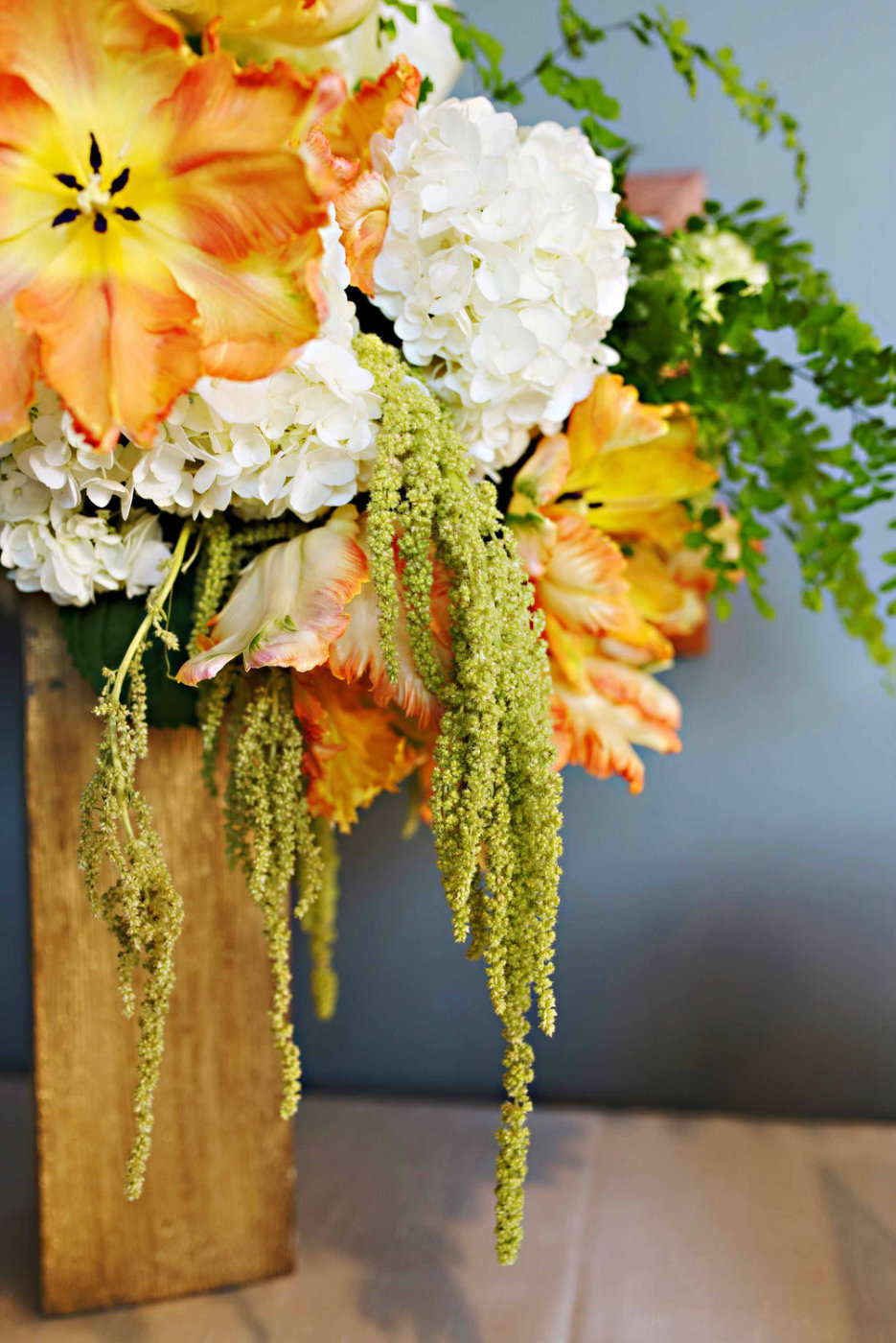 Beautiful orange parrot tulips mimic the Chihuly sculpture shapes for our spring wedding.