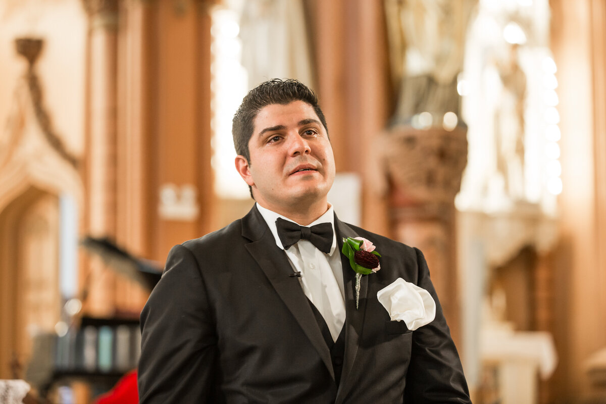 Groom cries when he sees the bride walking down the aisle.