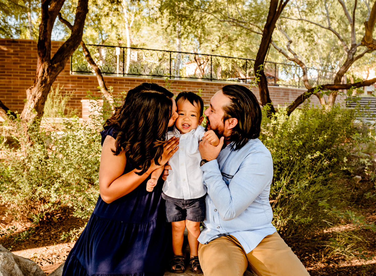 Arizona parents and son posing for family portrait during photography session