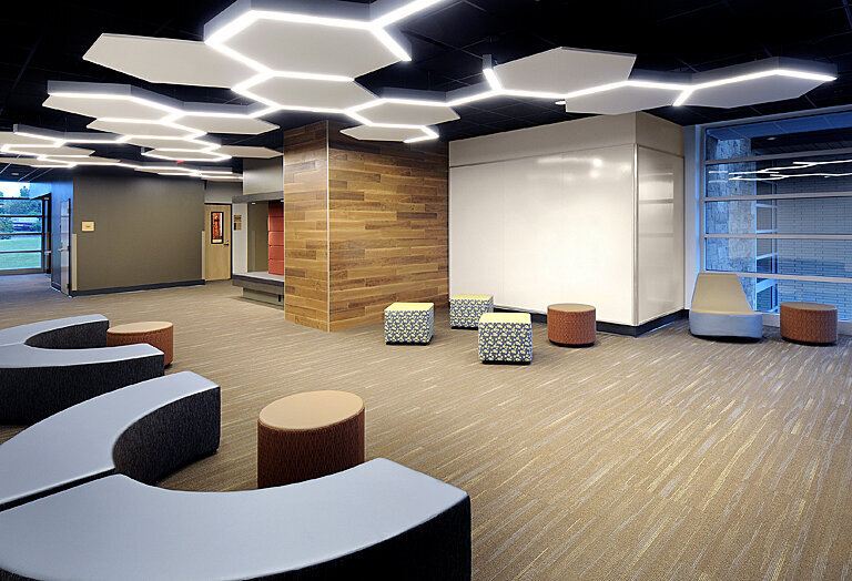interior view of student common area  at The Walker School Warren science & technology building with modular furniture and lighting system