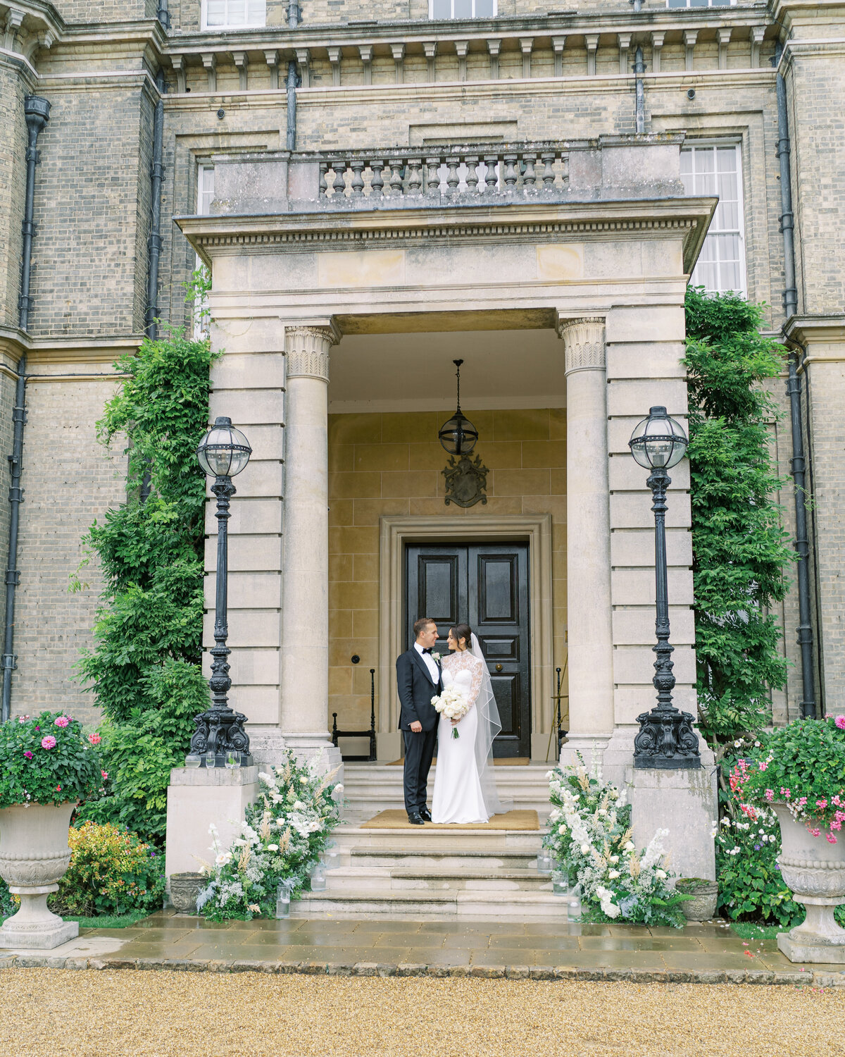 Bride and groom outside Buckinghamshire wedding venue Hedsor House