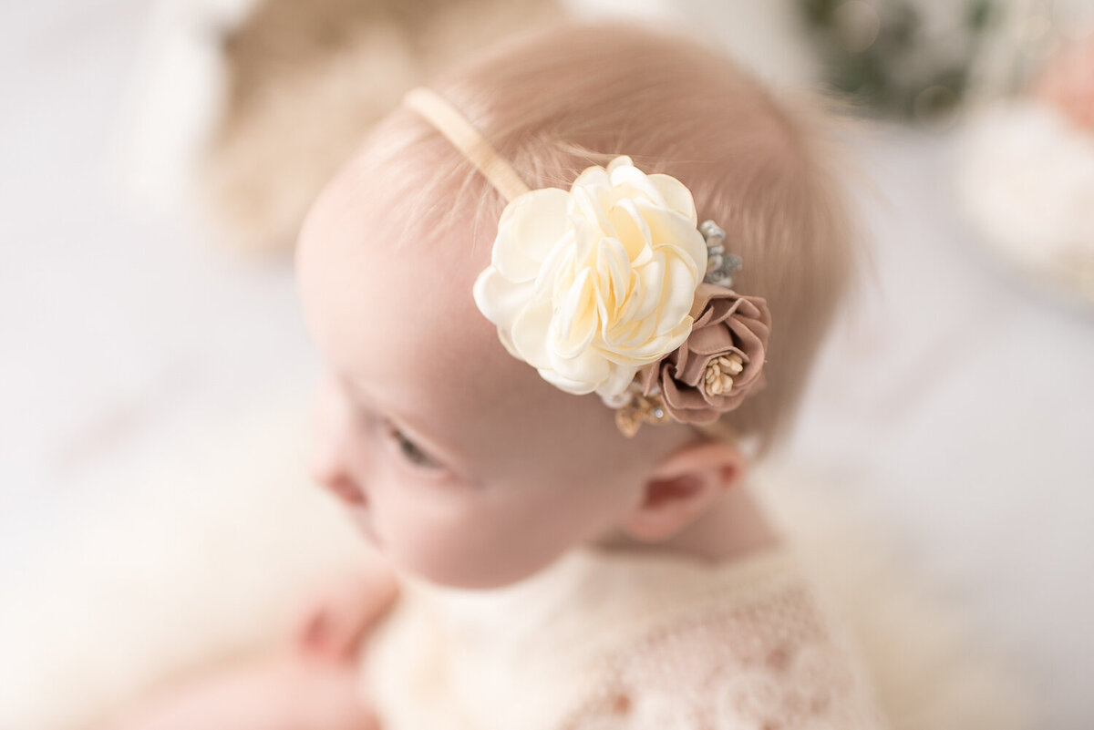 Close up of baby girl headband at cake smash session for first birthday |Sharon Leger Photography || Canton, CT || Family & Newborn Photographer