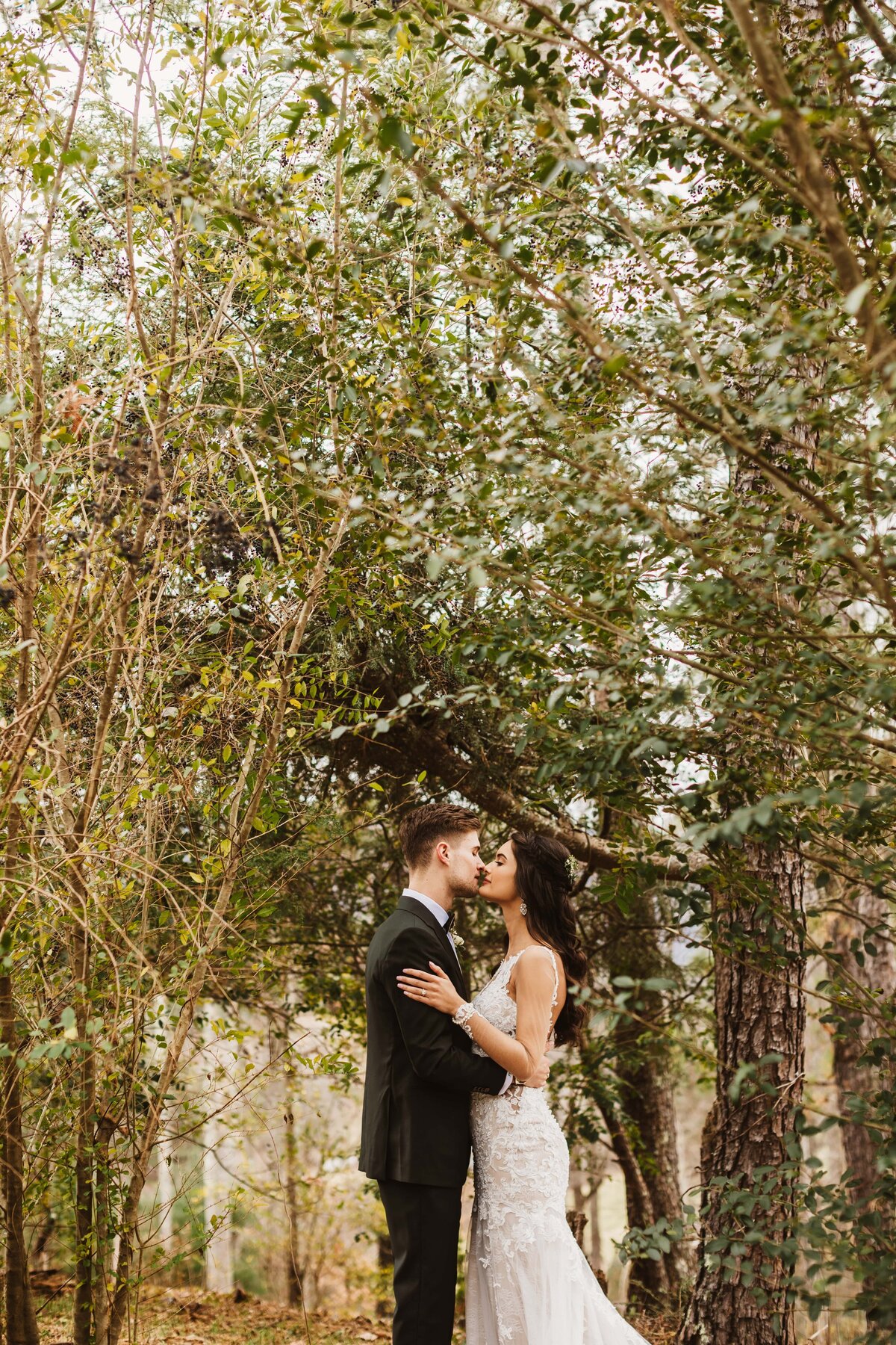 bride-groom-under-trees