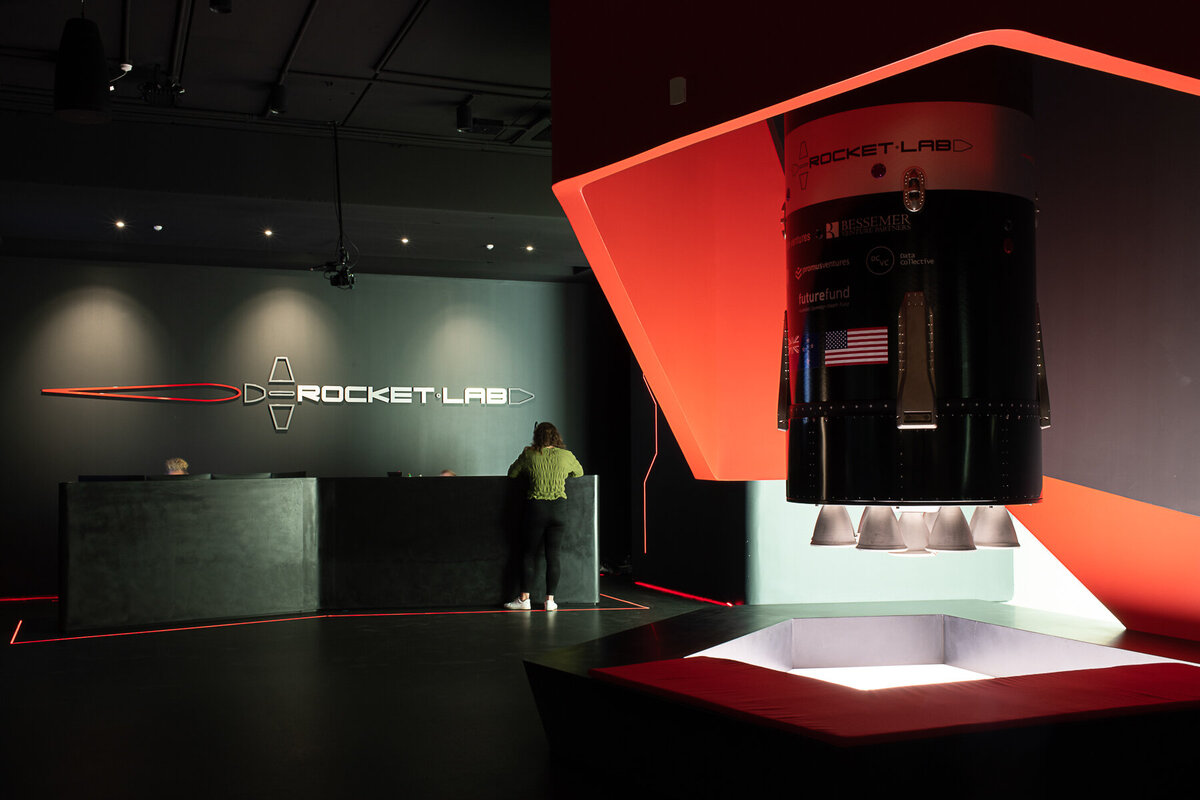 Rocket lab's Auckland Production Centre. Reception desk with electron engine section in foreground.
