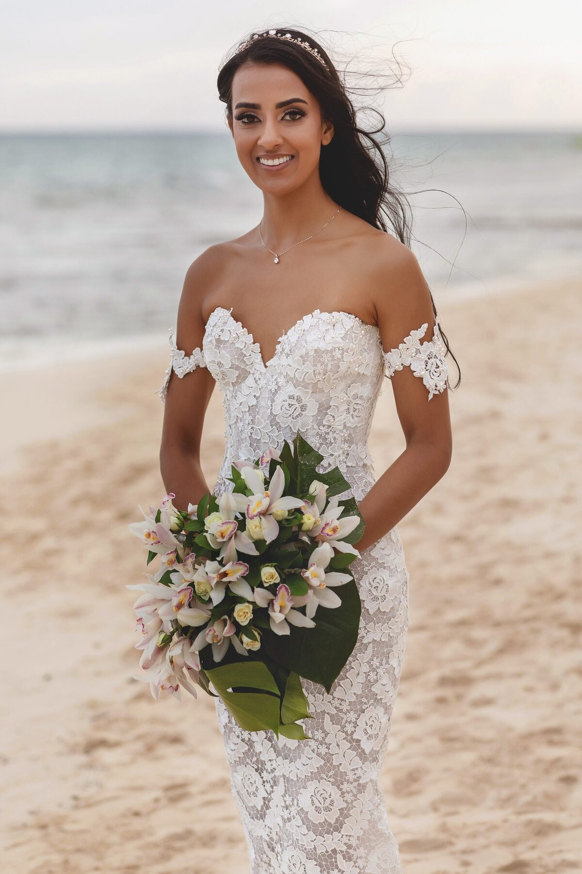 Portrait of bride on beach in Riviera Maya