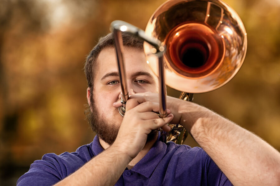 outdoor photos for senior boy with trombone