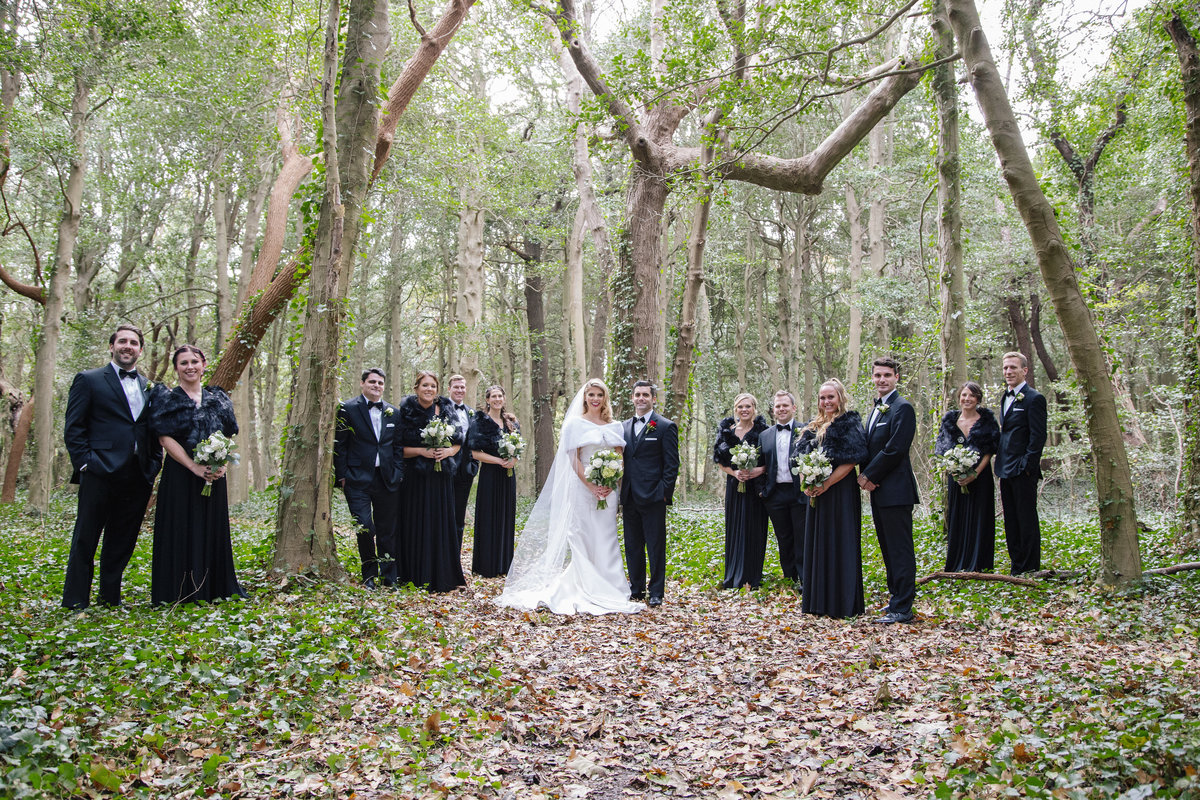 bridal party in woods in spring lake wedding
