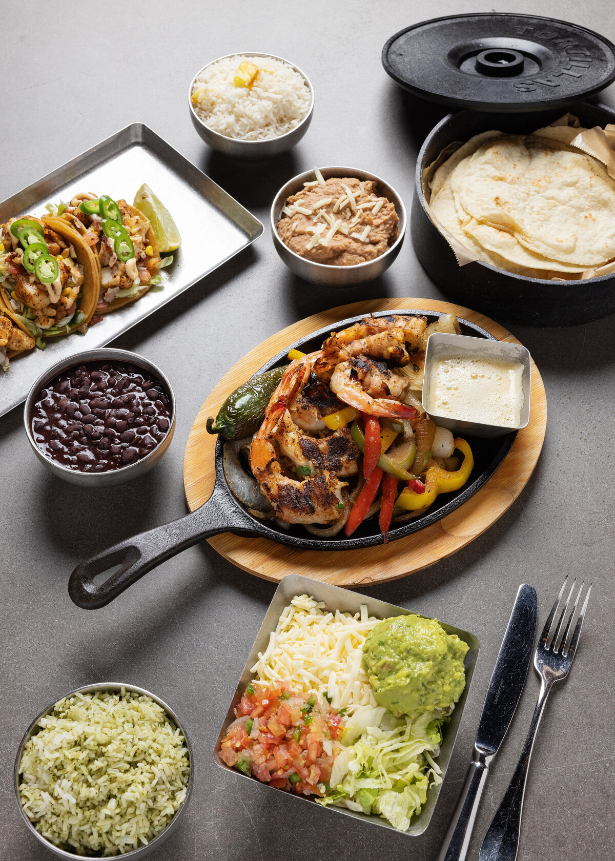 Fajita and tacos with fillings on a table