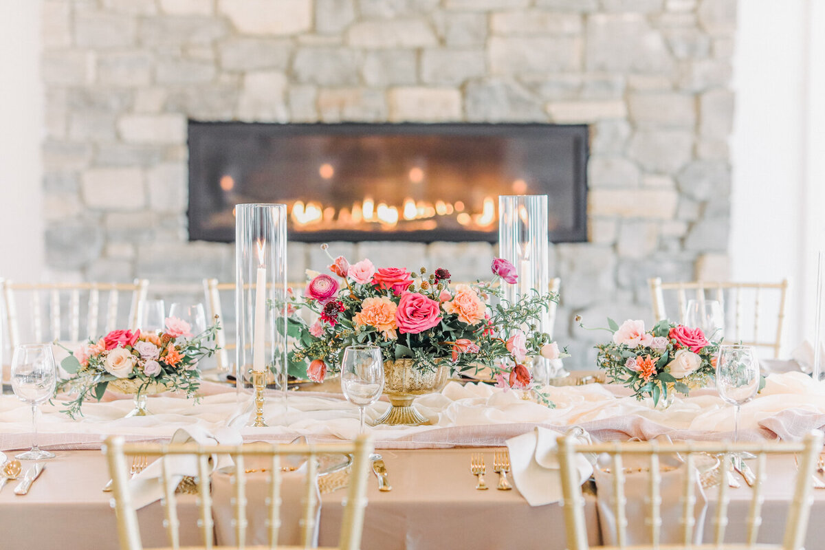 Luxury indoor Michigan wedding reception with fireplace