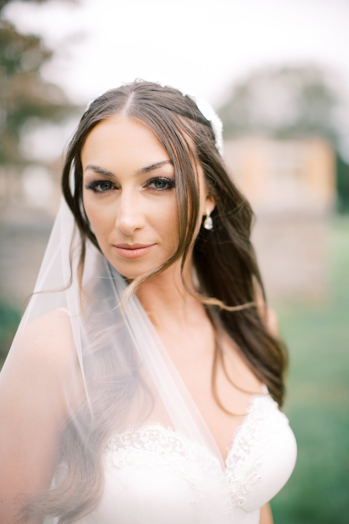 bride wearing veil looking into camera during philadelphia wedding photography