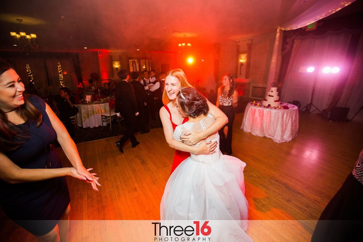 Bride dancing with Bridesmaid