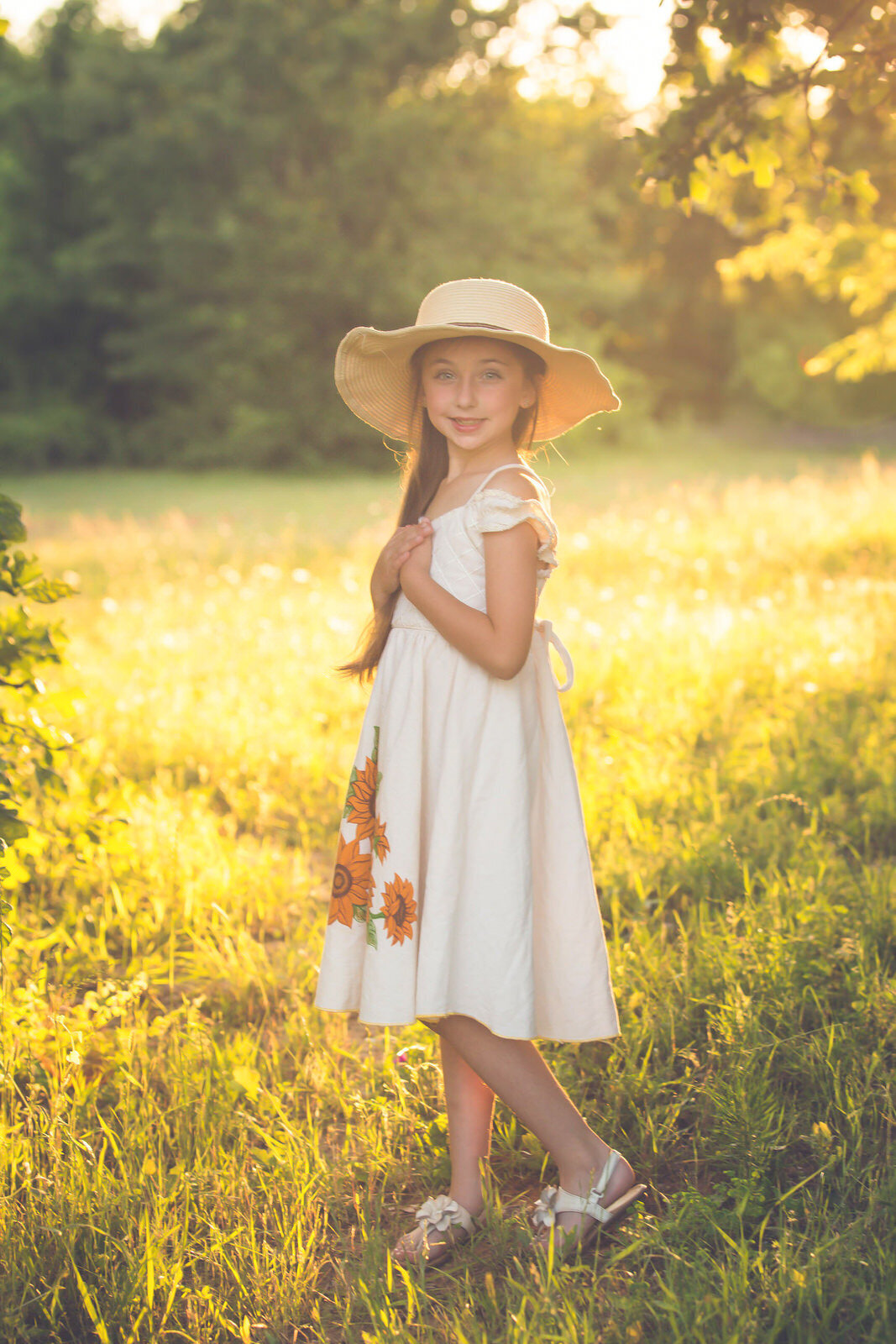 girl-in-sun-wearing-white-dress-and-hat