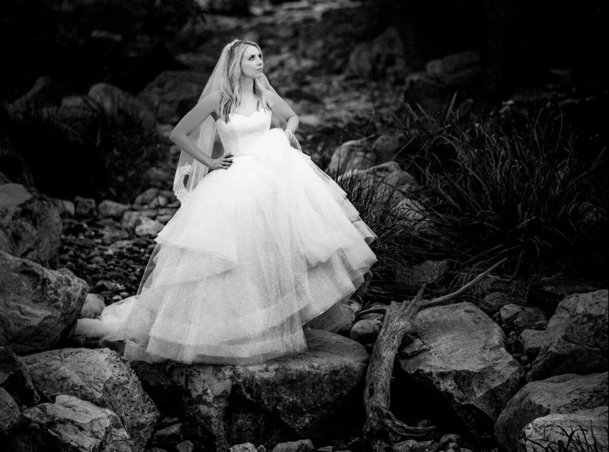 a bride standing on rock