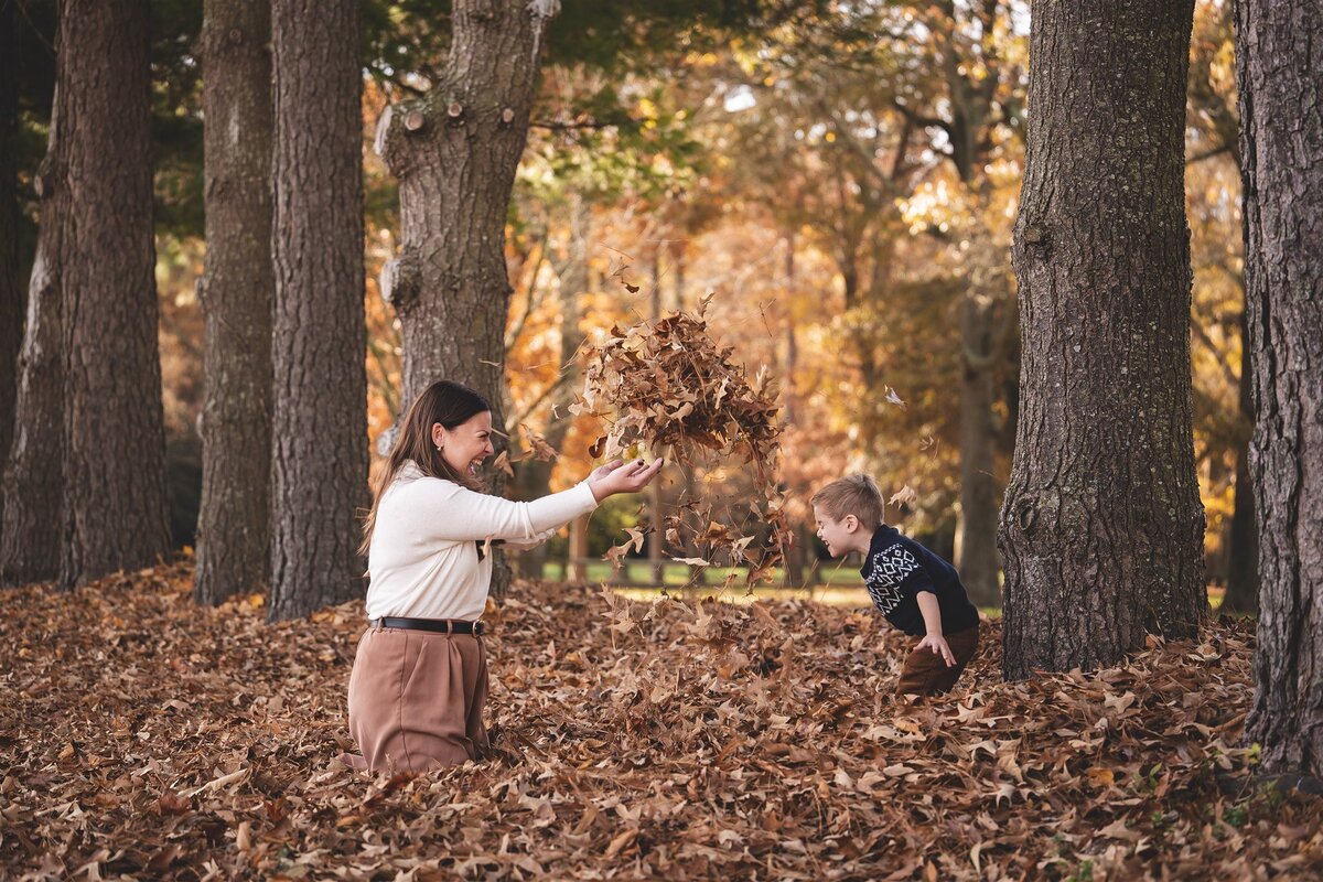 Pemberton Park Fall Session Laughter Leaves Leaf Pile Mom Son