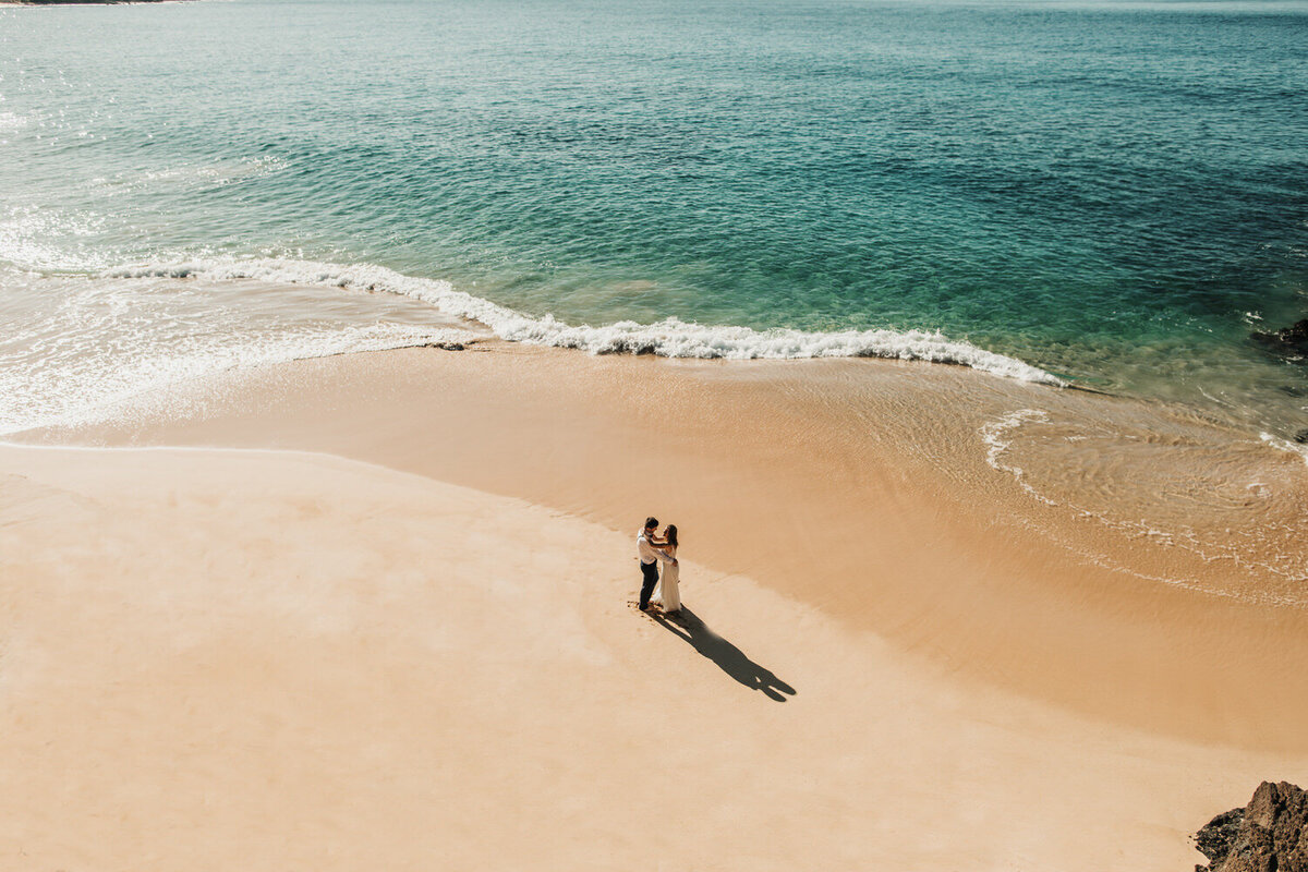 couple posing on the beach