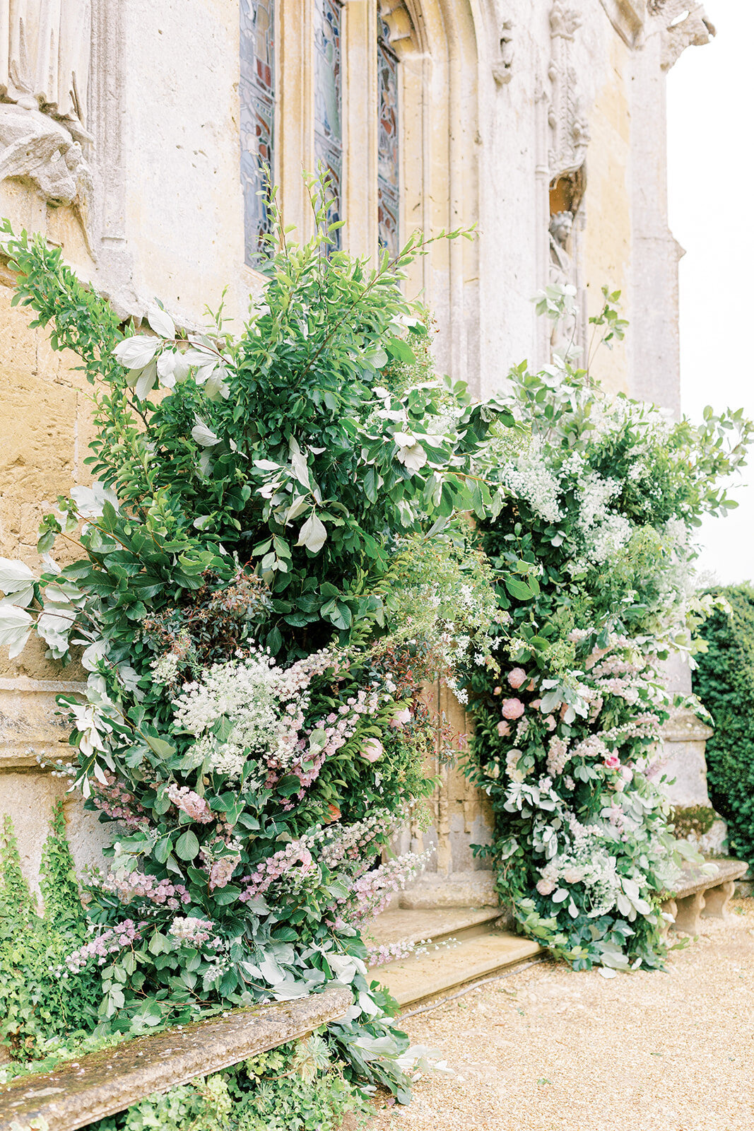 sudeley-castle-church-entrance-wedding-flowers