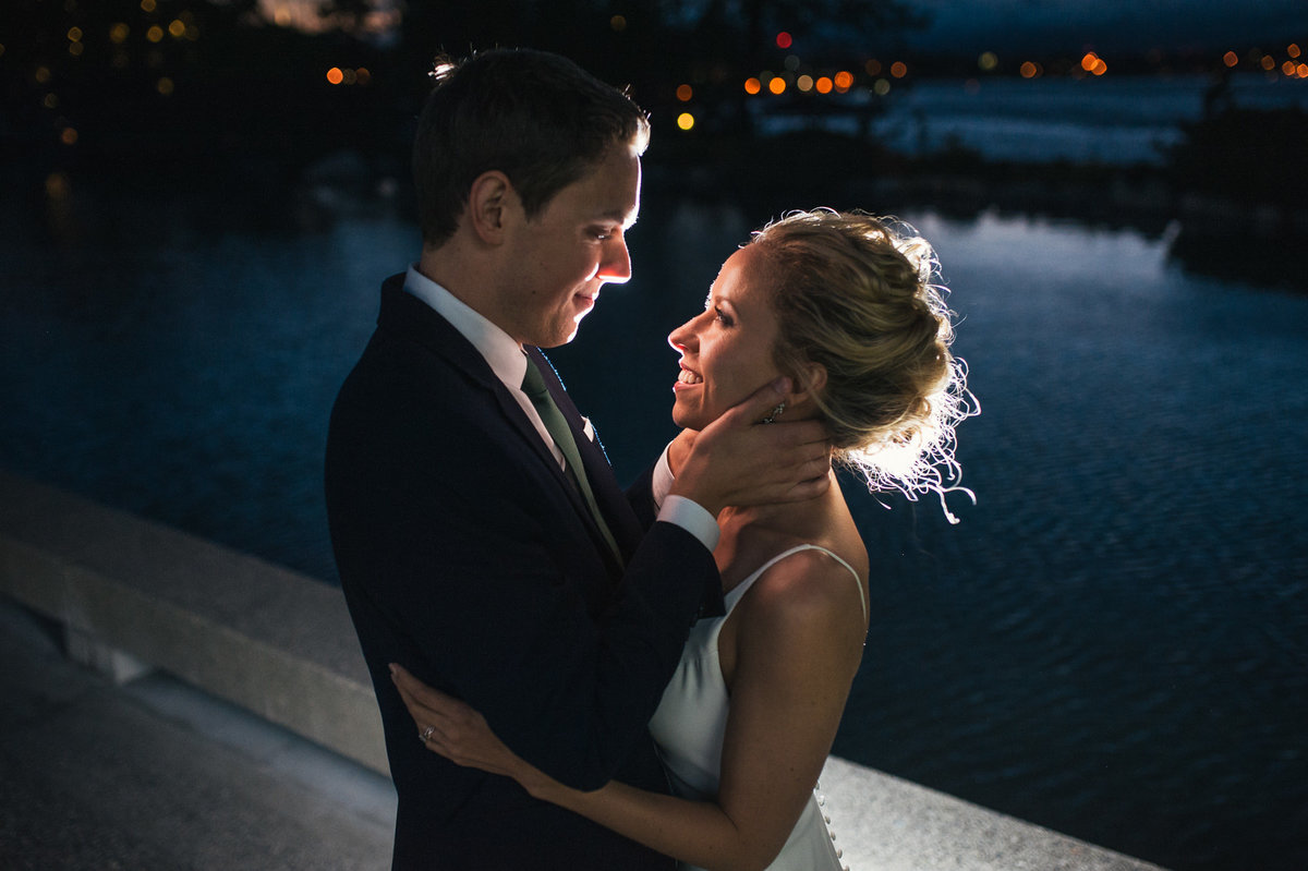 Night time shoot with couple overlooking inner harbour