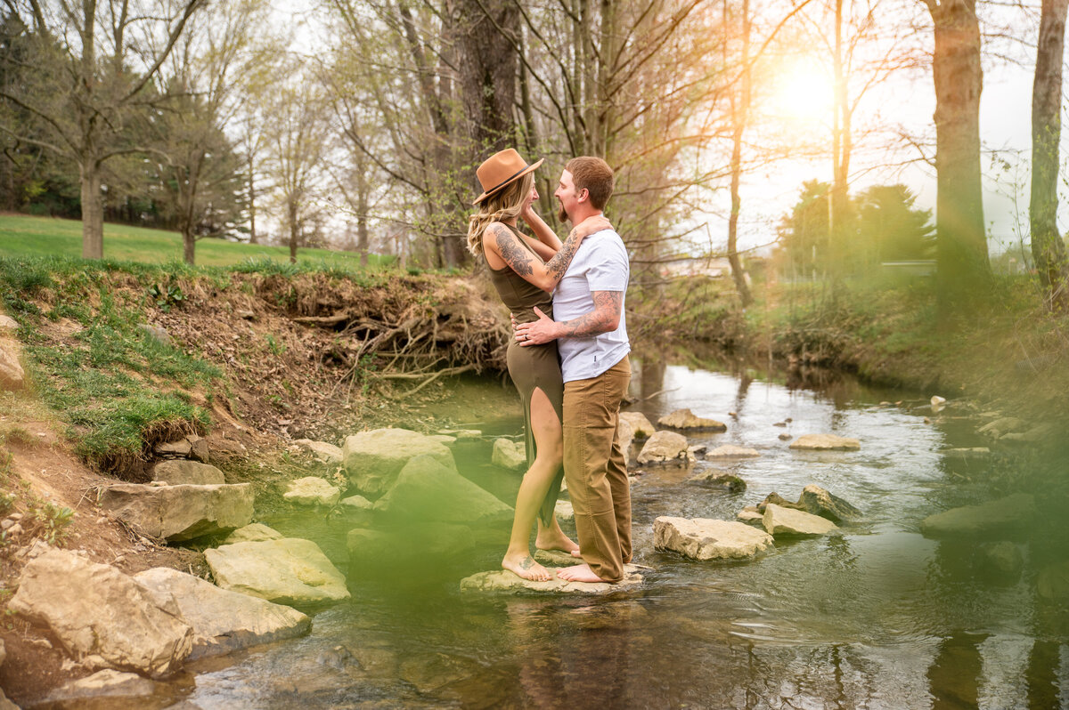 Couple's photo session in the Tuscarawas River at Dover City Park.