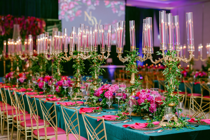 secret-garden-wedding-reception-purple-pink-green-greenery-flowers-candelabra-candle