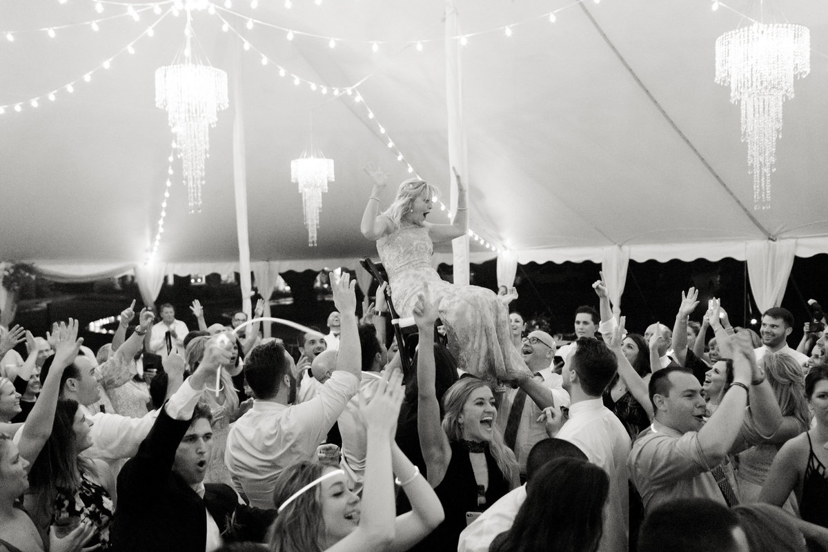 tent wedding with hanging chandeliers