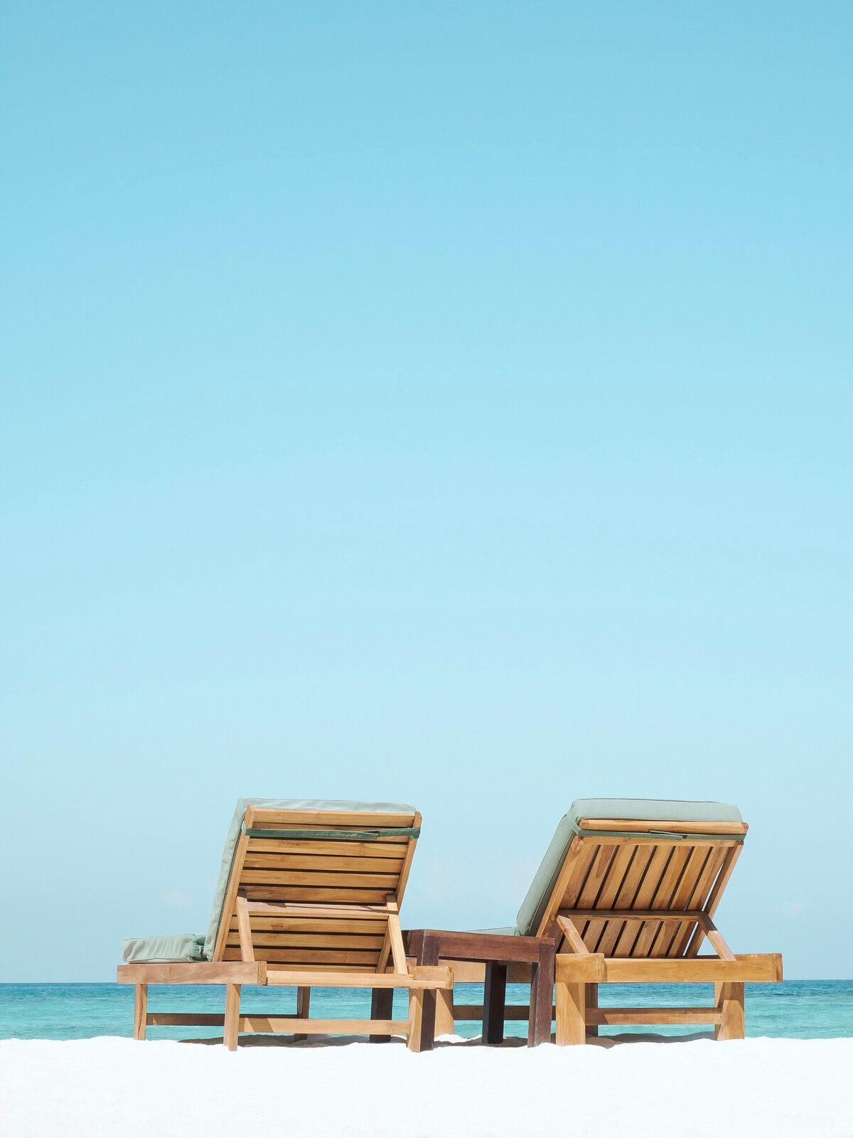 lounge chairs on beach