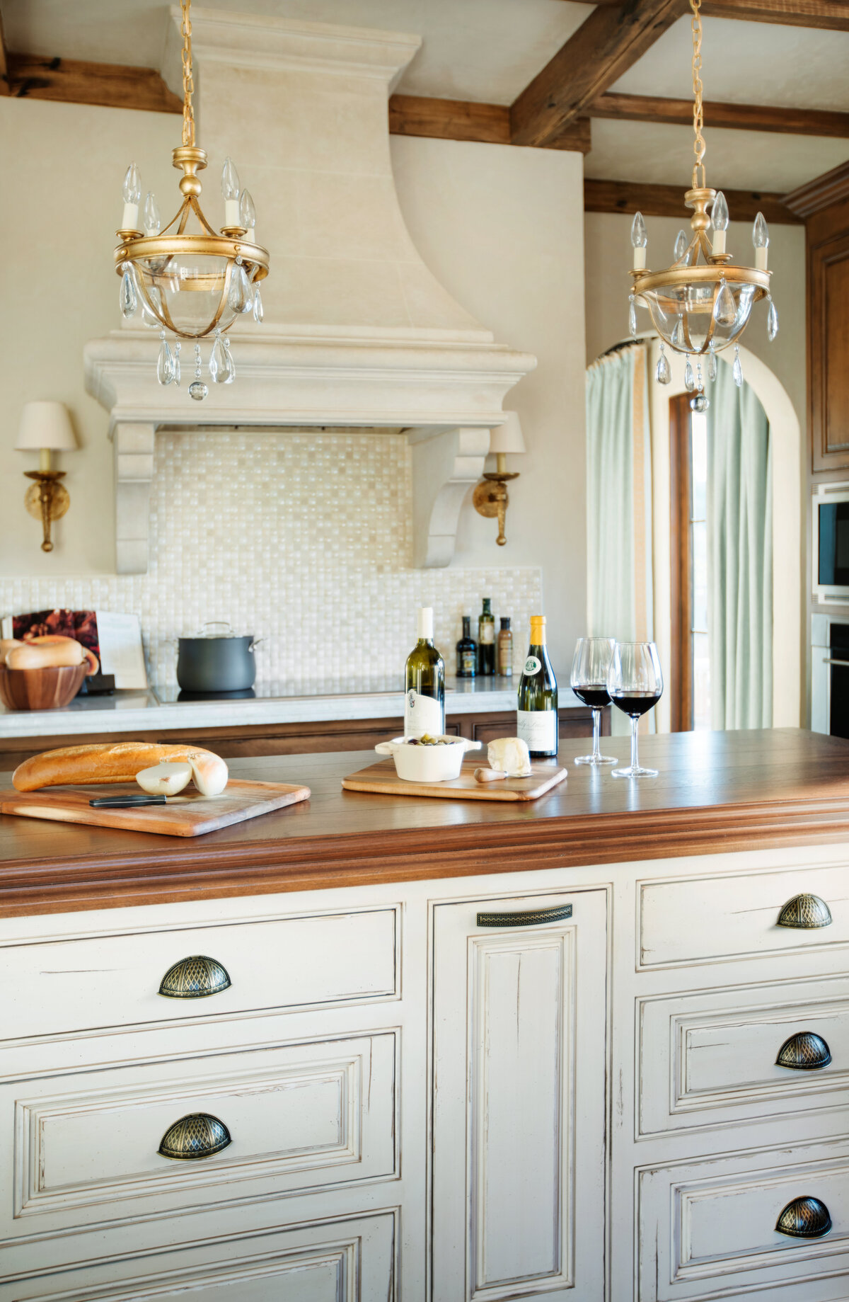 Panageries Residential Interior Design | Italian Country Villa Kitchen Island Details with Wine and Bread