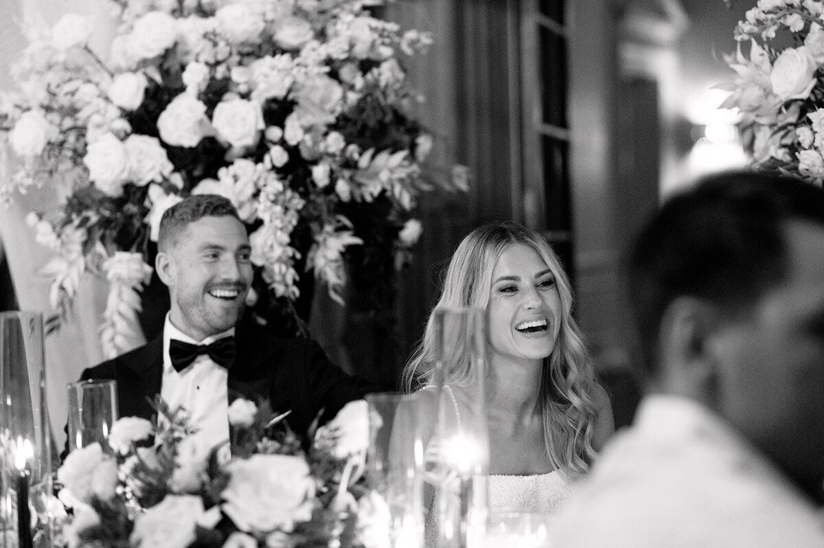 Candid Reception Couple laughter at Graydon Hall Manor Tented Reception Toronto Wedding Venue Jacqueline James Photography