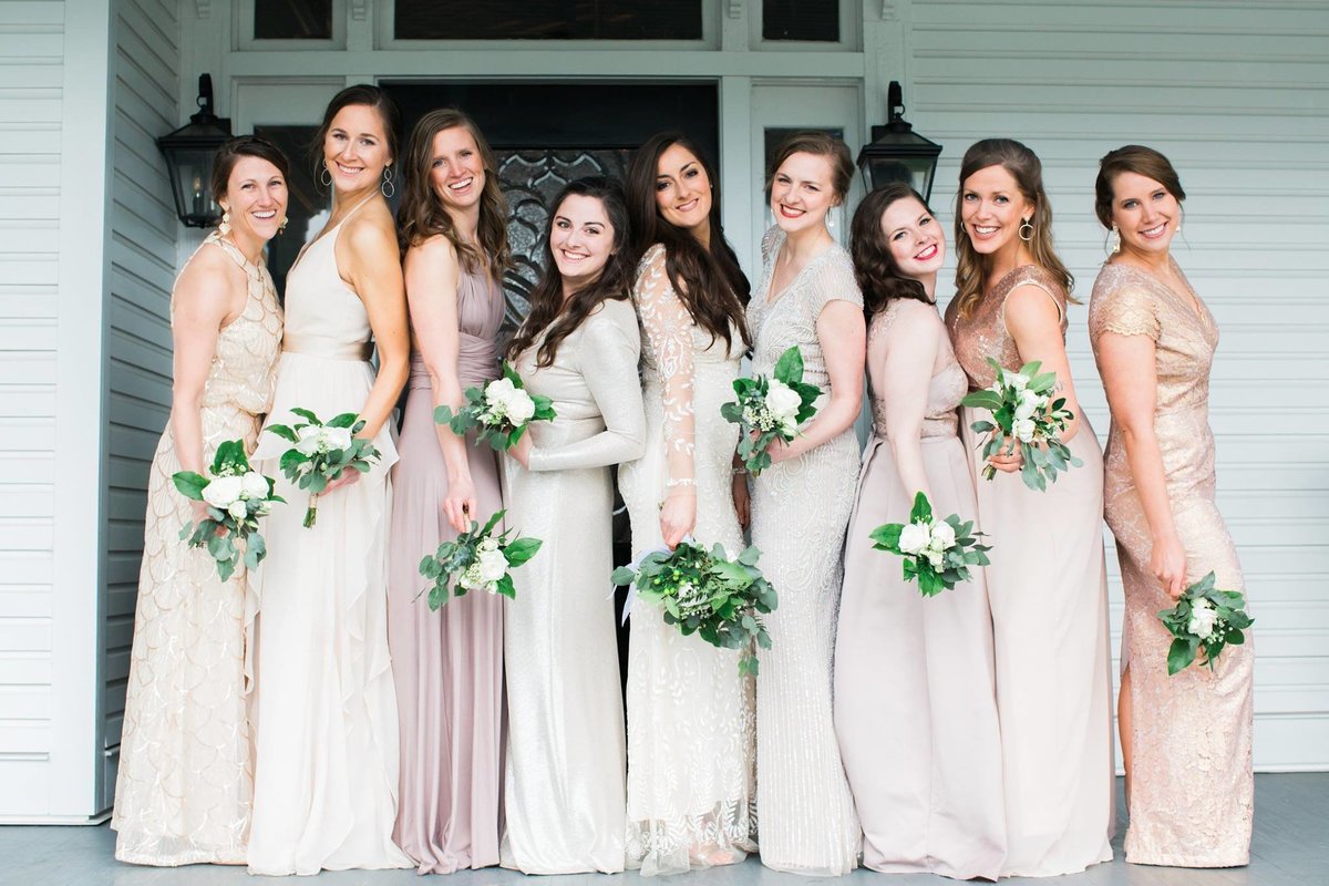 Wedding Photographer, bridesmaids standing together on porch