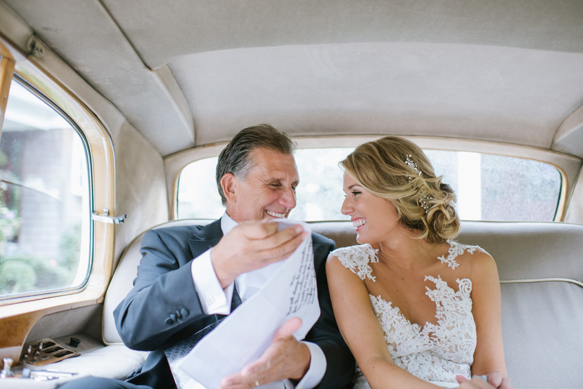 candid wedding photography oheka castle fun candid love bright father bride limo