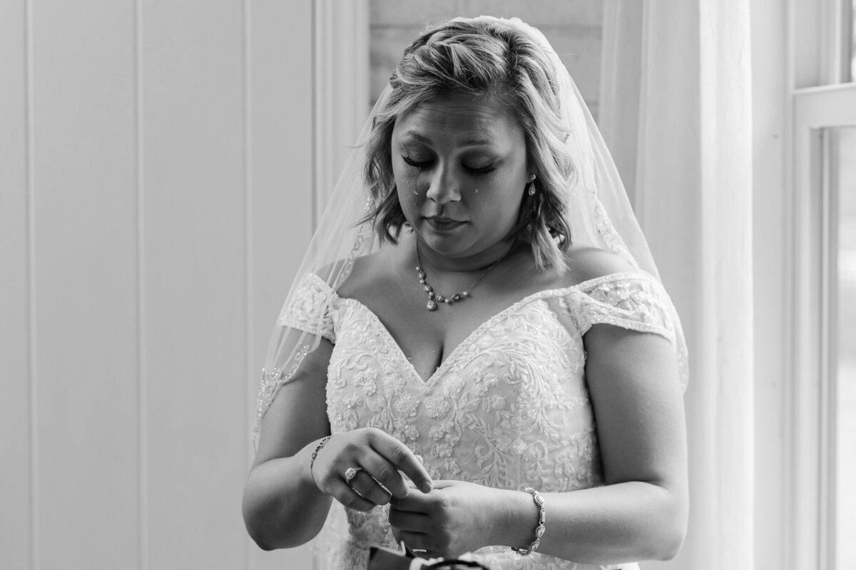 Bride cries after receiving a bracelet from her groom