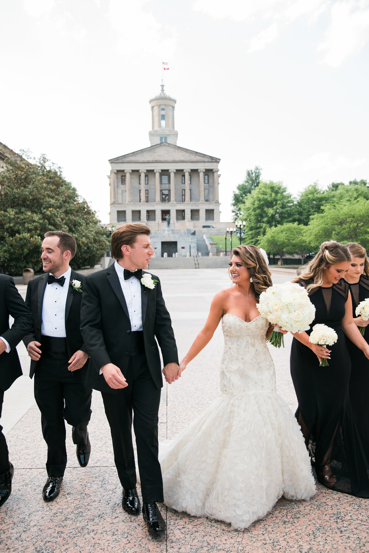 Wedding party with Tennessee capital in the background.