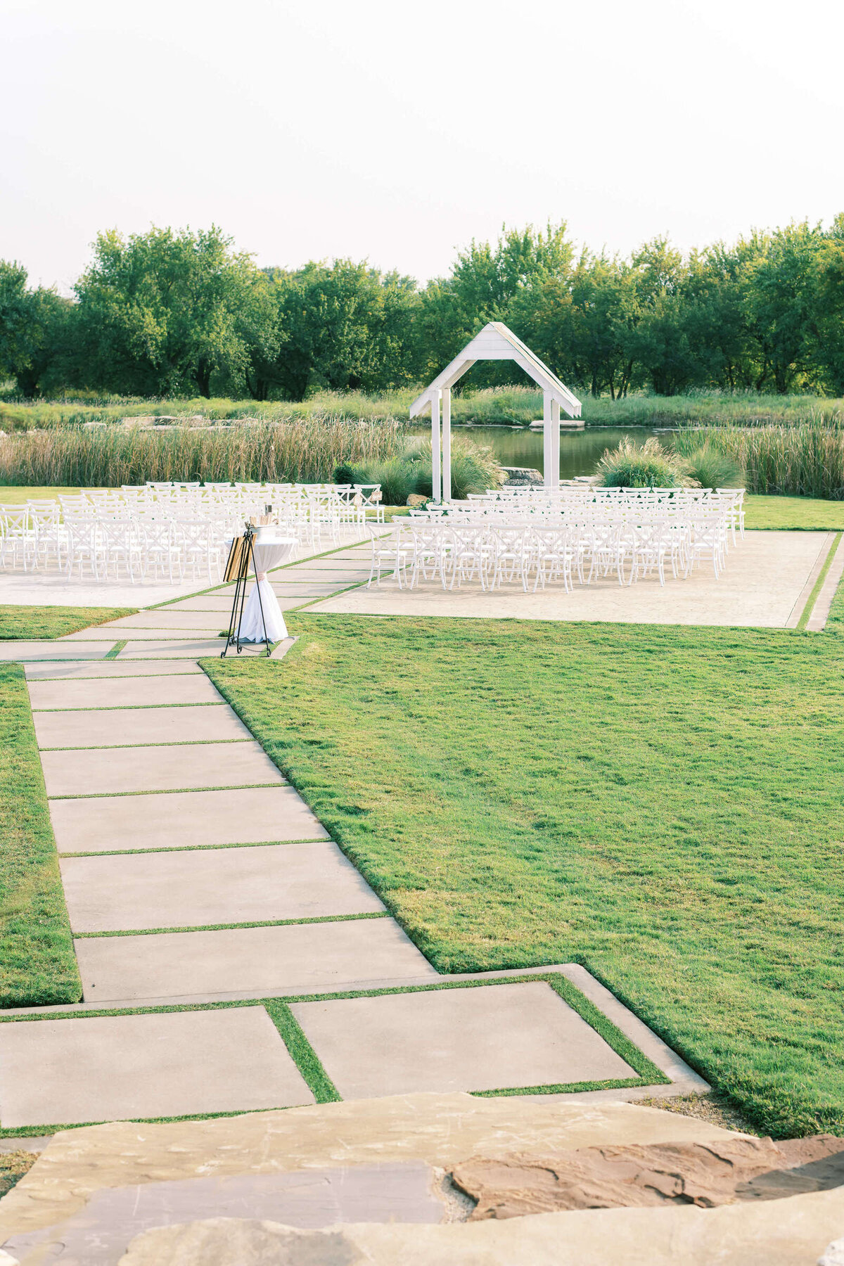 Outdoor ceremony are at The Nest at Ruth Farms wedding venue in North Texas