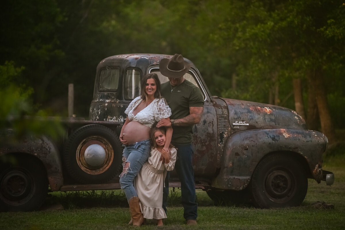 family outdoor portrait photographer maternity vintage truck santa fe texas