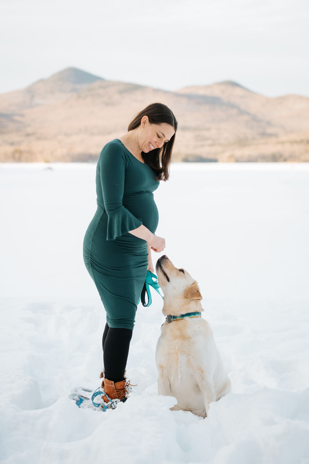 pregnant maternity woman with golden retriever dog at chittenden reservoir lefferts pond