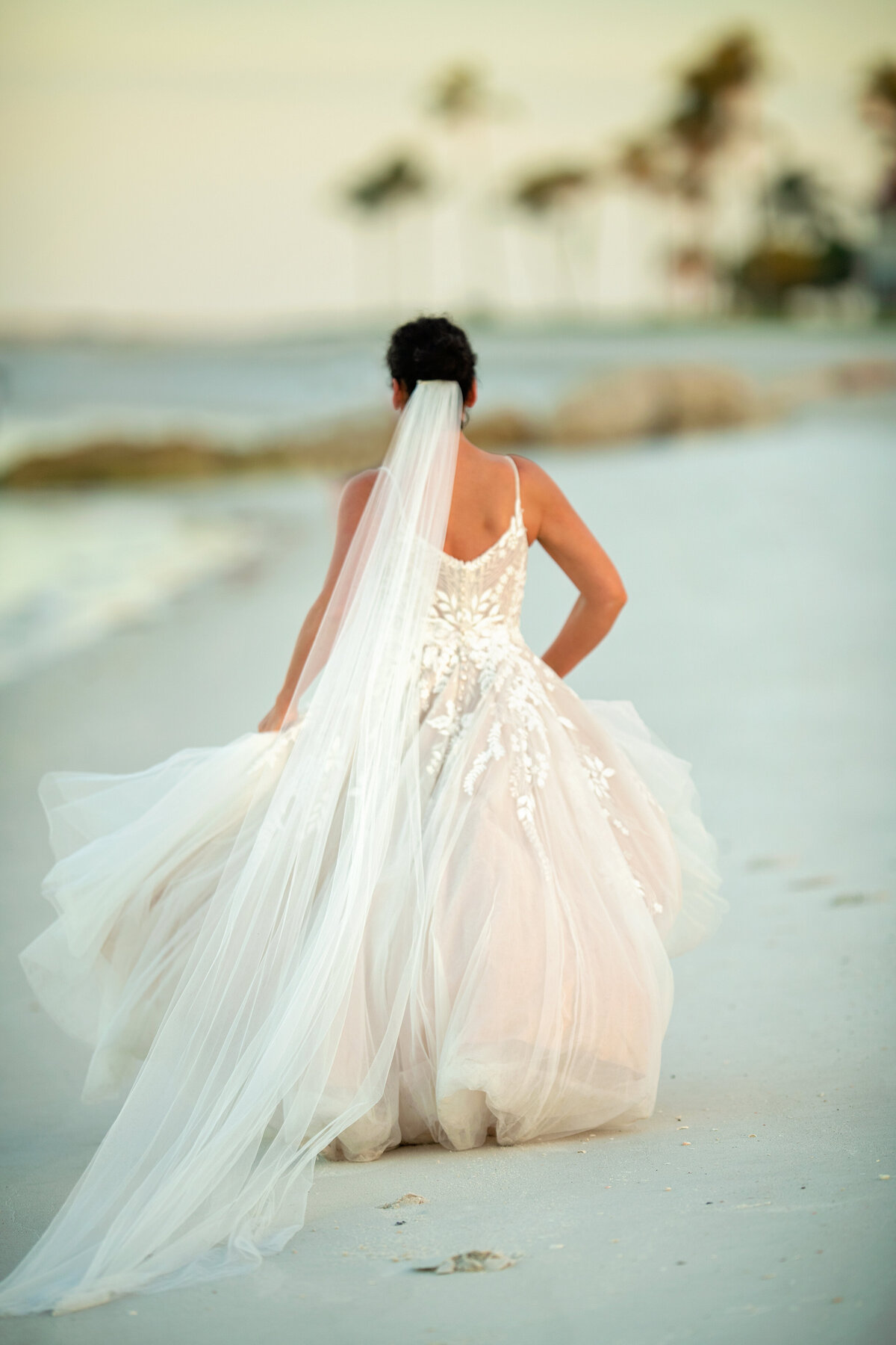 Runaway bride on gulf of Mexico  sand in florida