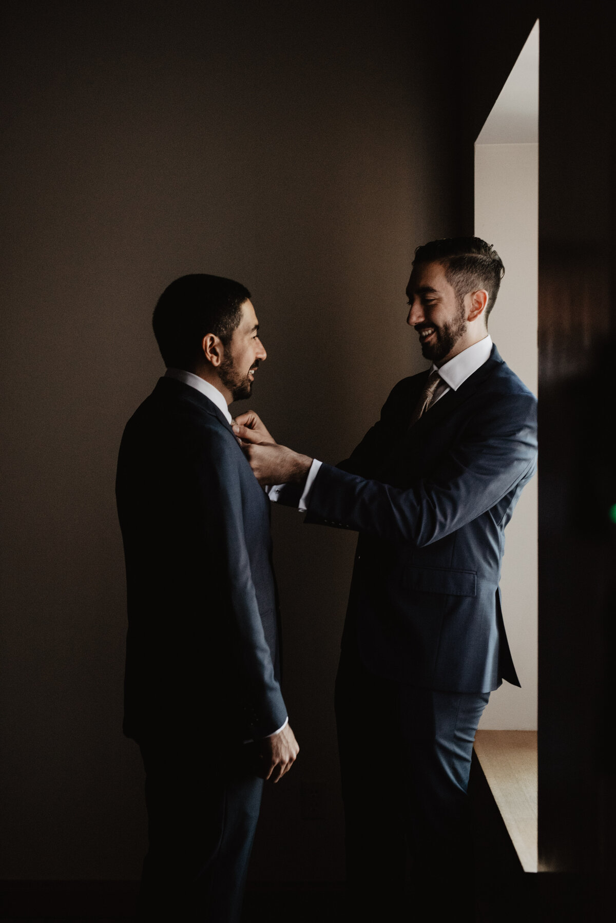 Photographers Jackson Hole capture groomsmen with groom