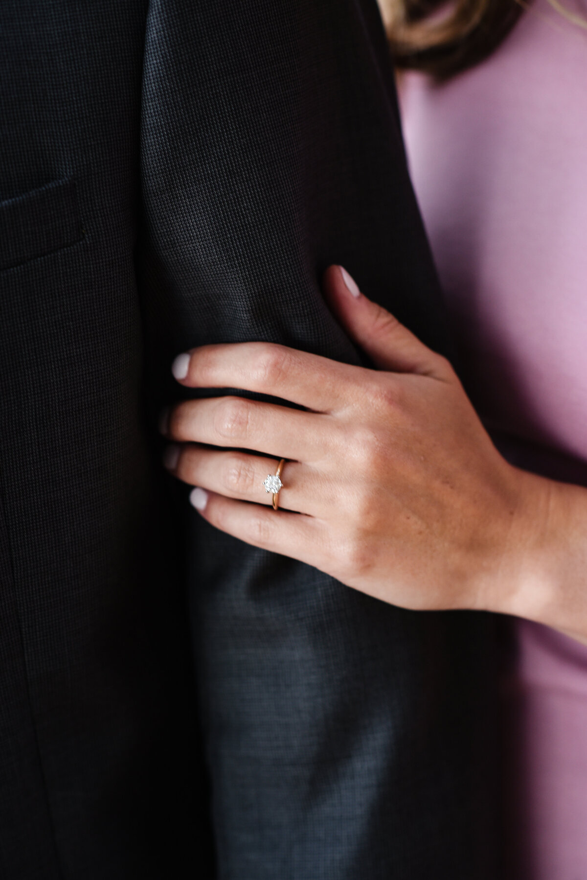 Beautiful Mississippi Engagement Photography: lady shows ring off on gentleman's arm, Biloxi Mississippi Wedding Photographer