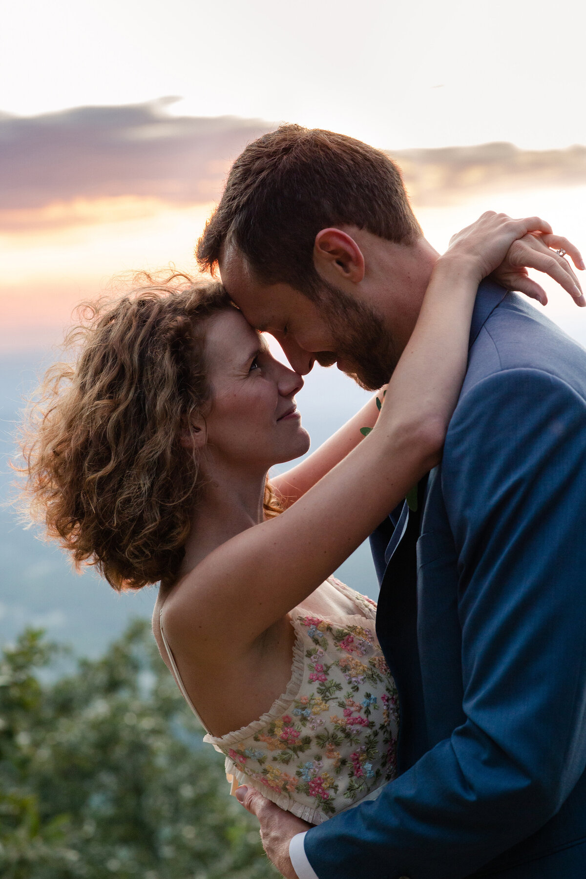 A romantic sunset shoot during a 10 year anniversary renewal of vows on Cheaha Mountain in Delta, Alabama.