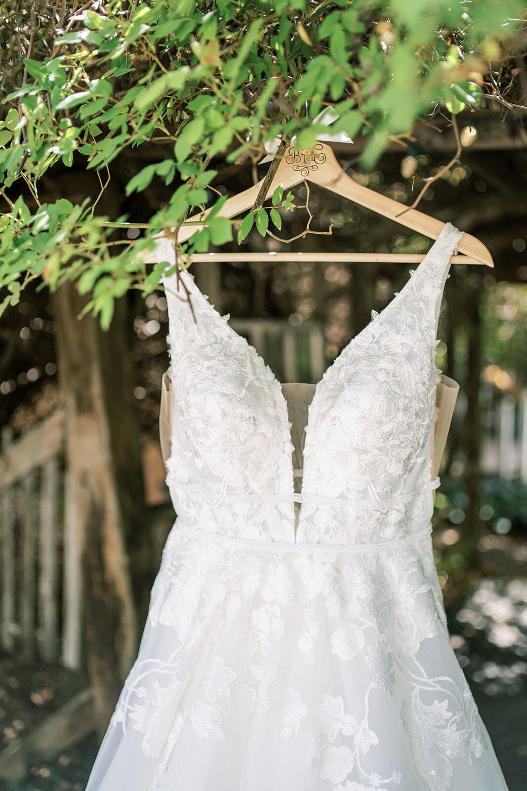Brides wedding dress hanging at Union Hill inn in Sonora CA