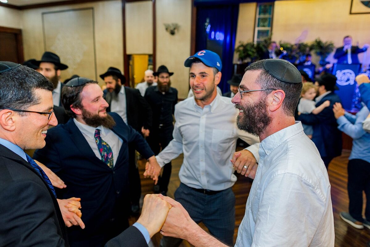 Eliana-Melmed-Photography-Chicago-LosAngeles-Jewish-WeddingPhotographer-CarmiKalman-MensDancing-00010