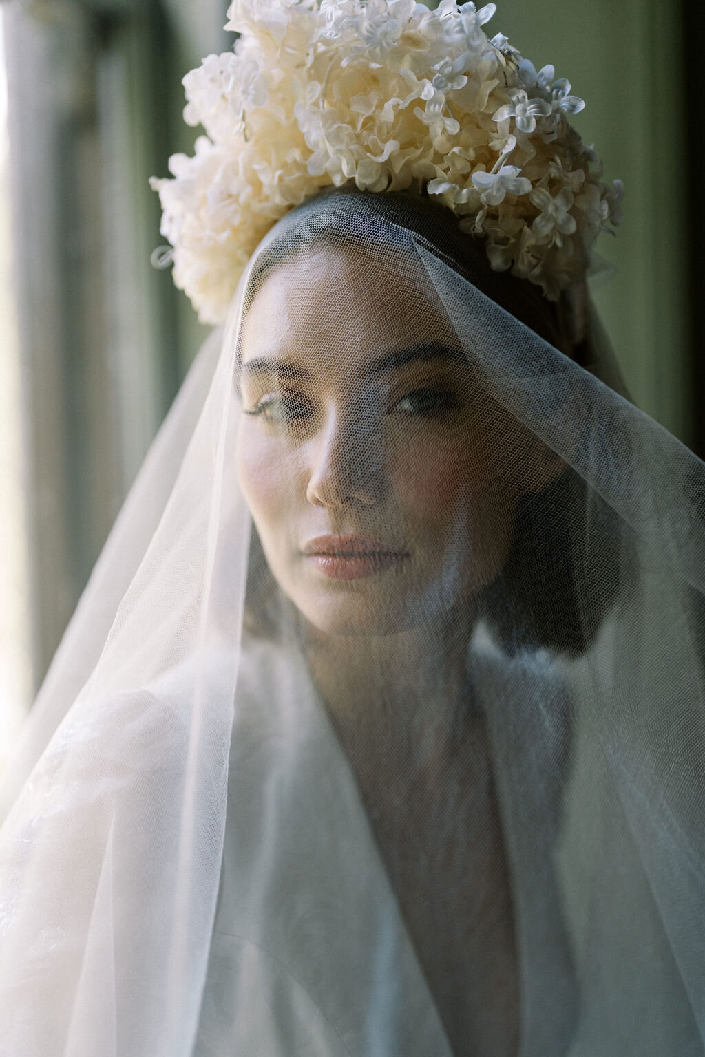 bride wearing veil headpiece