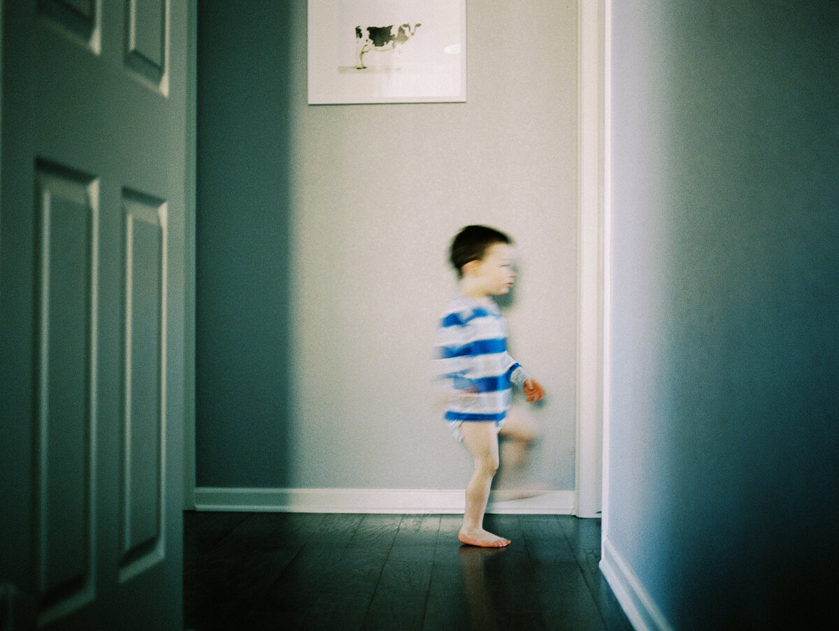 son walks through house