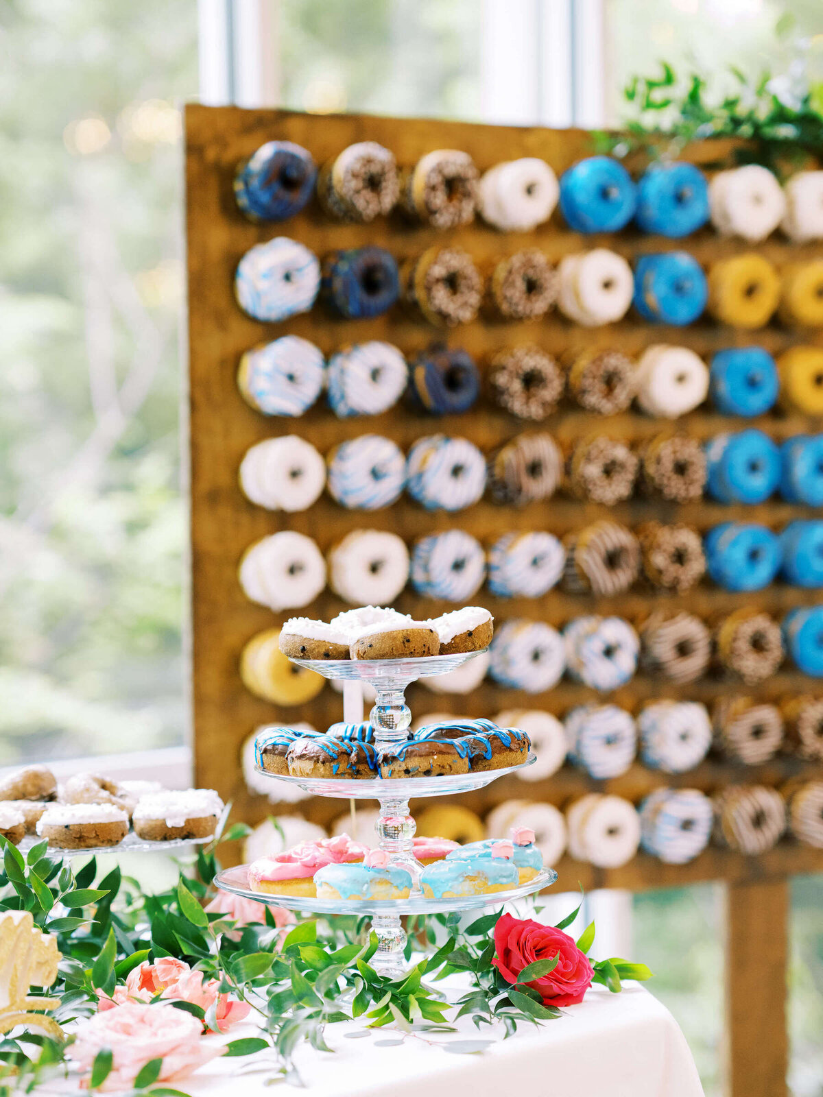 Colorful donut wall at Dallas wedding in Ashton Gardens