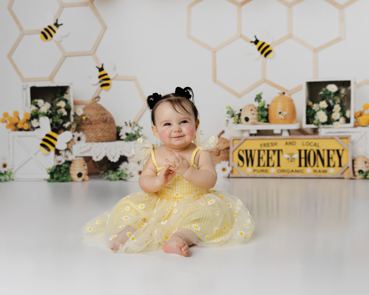 From frosting-covered fingers to the happiest birthday twirls, this bee-themed session was buzzing with joy. Captured by Yucaipa cake smash photographer Kaitlyn Dawn Photography.