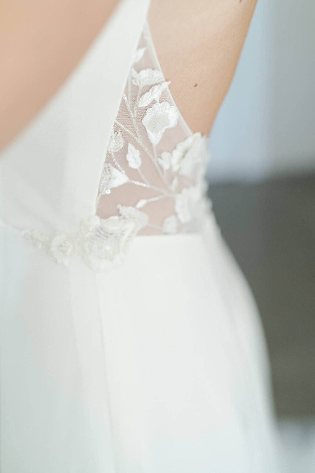 Beautiful wedding dress with petal details for the bride.