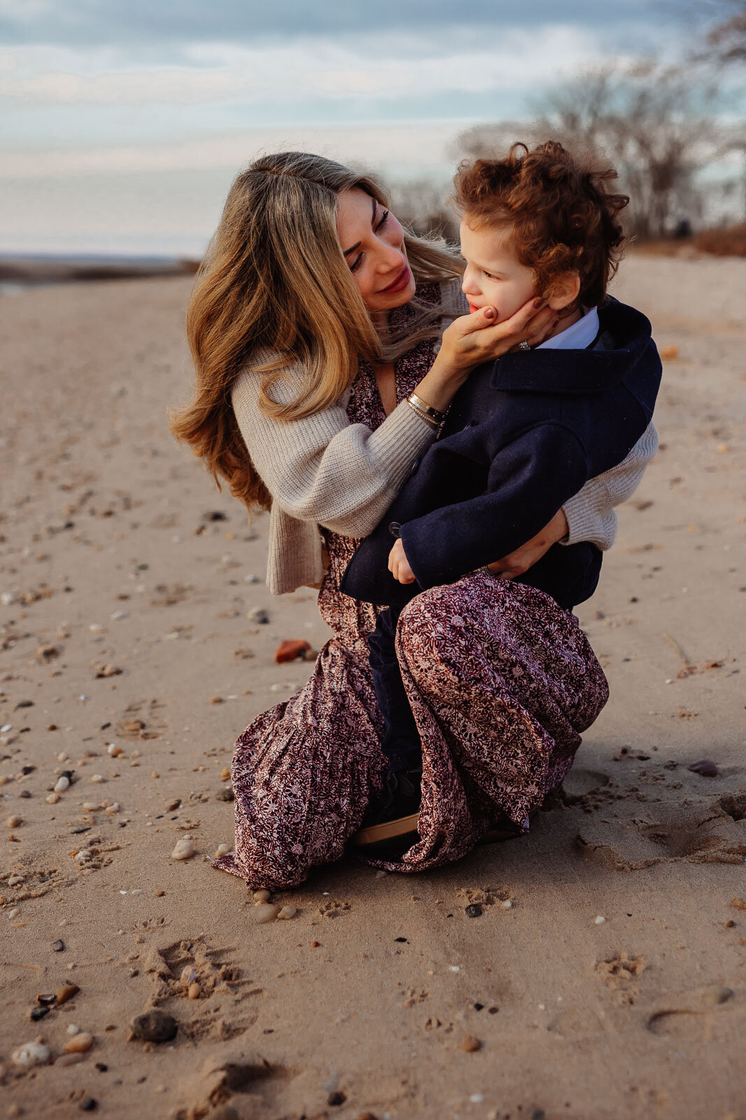 mom and son on beach during long island family portrait session
